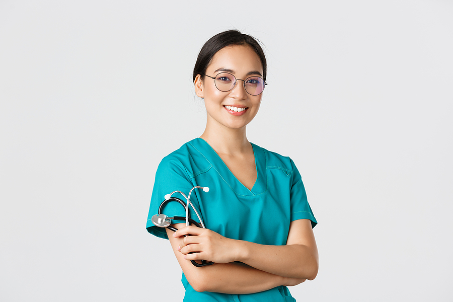 student in a medical assistant program smiles at camera