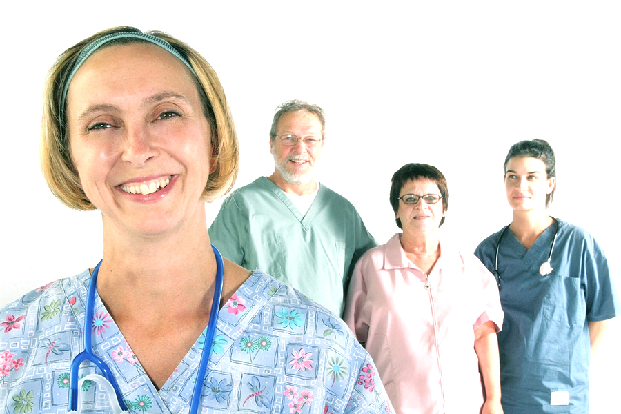 Smiling healthcare staff ready for work.