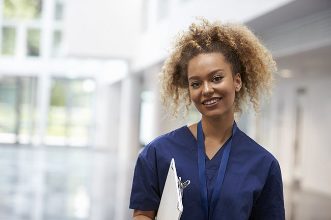 bigstock-Portrait-Of-Female-Nurse-Weari-146141549.jpg