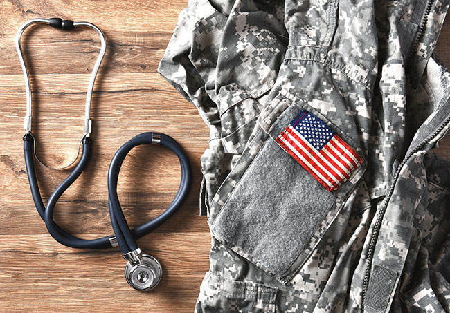 bigstock-US-military-fatigues-and-steth-113976347.jpg