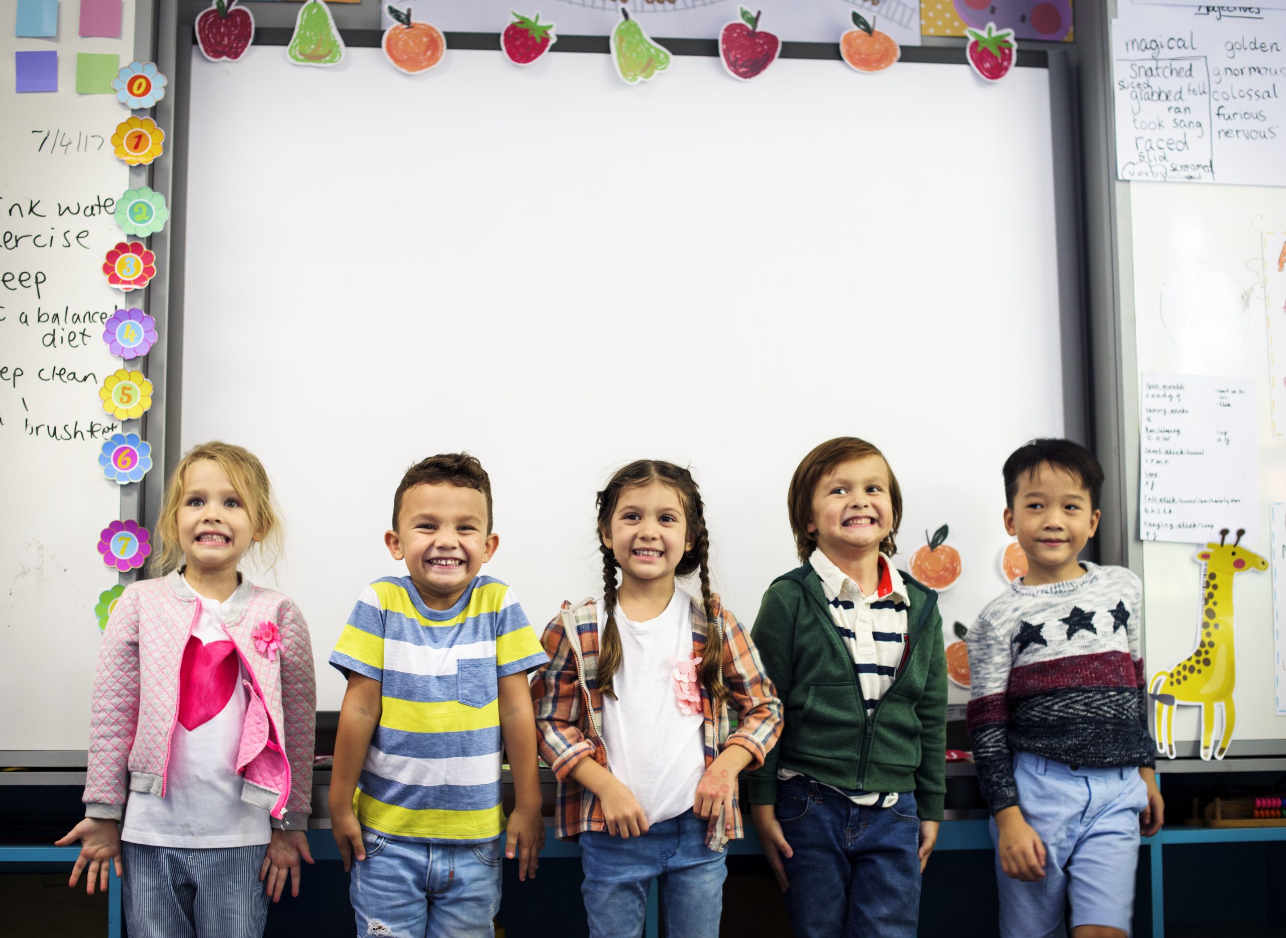 group-of-diverse-kindergarten-students-standing-to-PJ8KR2U