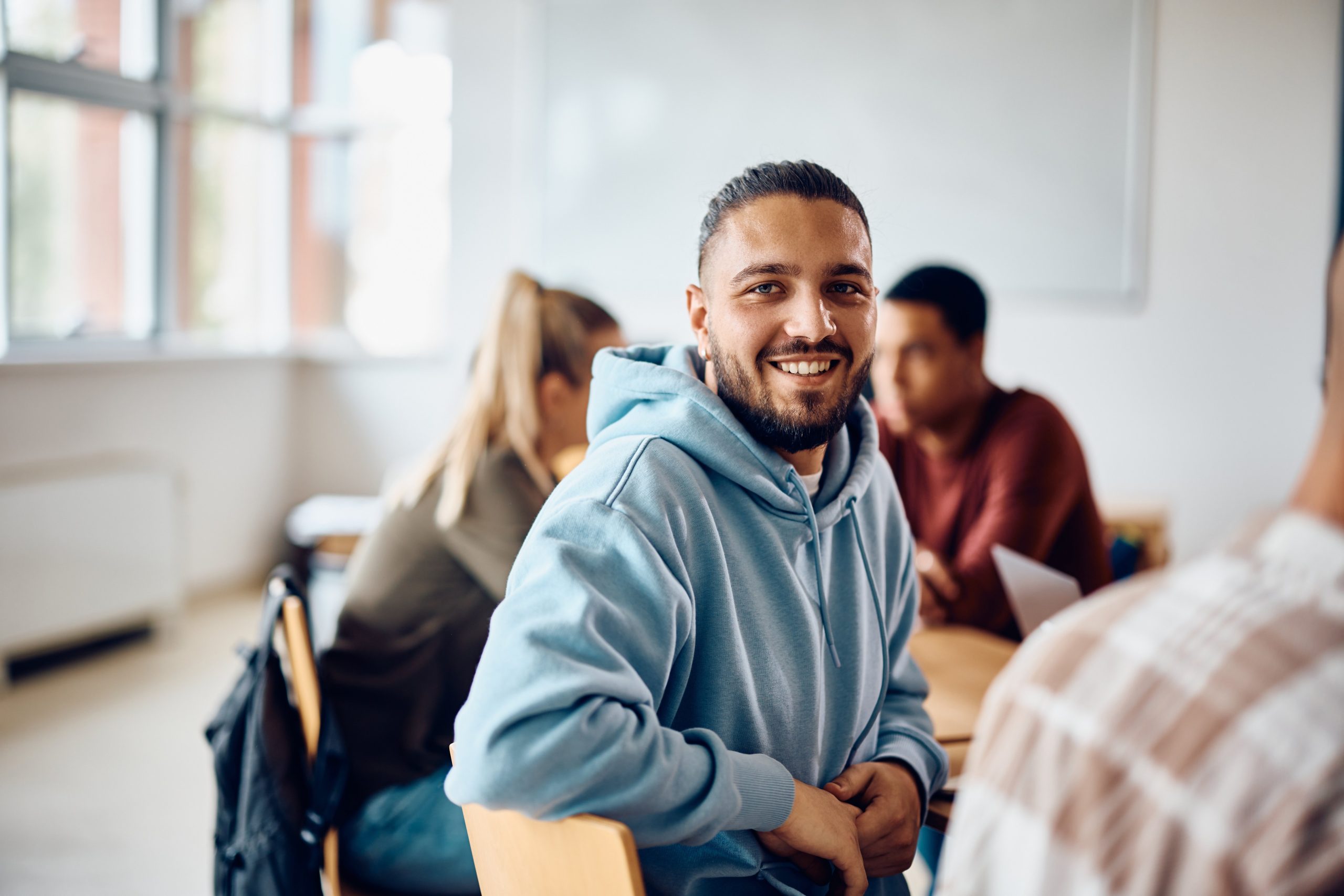 male medical assistant student in a medical assistant program classroom