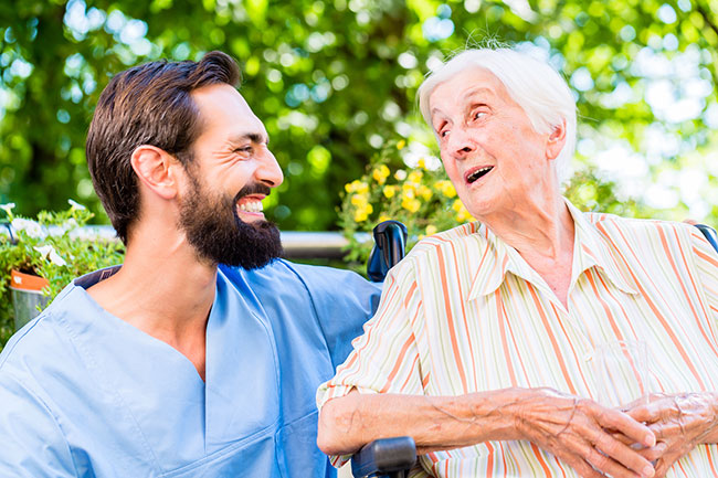 nurse-having-chat-with-senior--.jpg