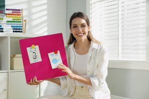 Female early childhood educator teaching students in her classroom.